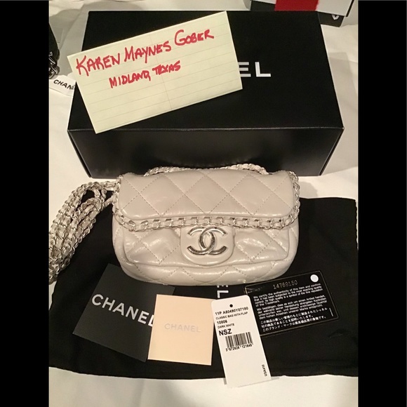 CHANEL Handbags - Authentic Mini Chanel Crossbody in white leather!